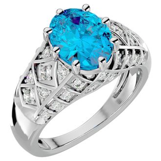 3 1/2 Carat Oval Shape Blue Topaz and Diamond Ring In 10 Karat White Gold