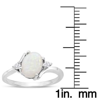 7/8 Carat Opal Ring and Two Diamonds In 14 Karat White Gold
