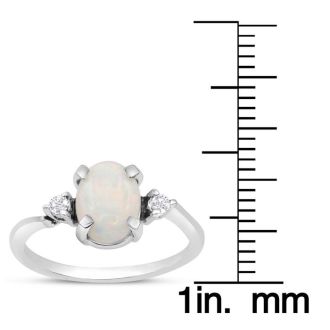 7/8 Carat Opal Ring and Two Diamonds In 14 Karat White Gold