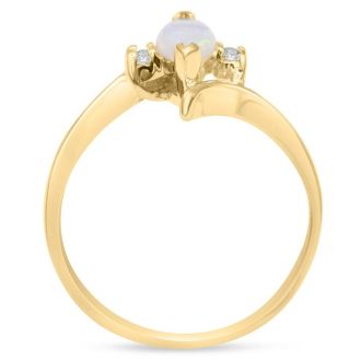 1 2 Carat Marquise Shape Opal Ring and Two Diamonds In 14 Karat Yellow Gold