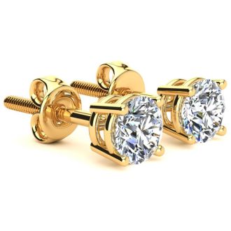 1 1/2 Carat Colorless Diamond Stud Earrings In 14 Karat Yellow Gold