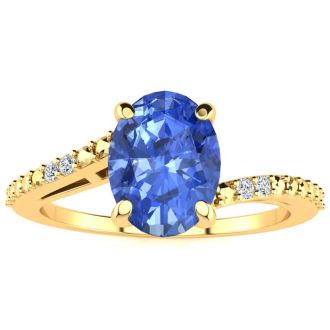 1 1/3ct Oval Shape Tanzanite and Diamond Ring in 10k Yellow Gold