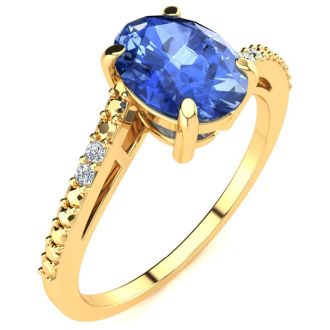 1 1/3ct Oval Shape Tanzanite and Diamond Ring in 10k Yellow Gold