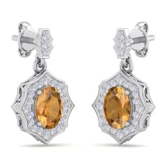 1 3/4 Carat Oval Shape Citrine and Diamond Dangle Earrings In 14 Karat White Gold