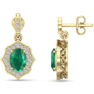 1 3/4 Carat Oval Shape Emerald and Diamond Dangle Earrings In 14 Karat Yellow Gold