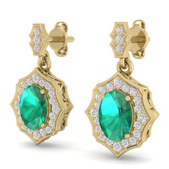 1 3/4 Carat Oval Shape Emerald and Diamond Dangle Earrings In 14 Karat Yellow Gold