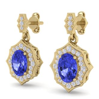 2 1/5 Carat Oval Shape Tanzanite and Diamond Dangle Earrings In 14 Karat Yellow Gold