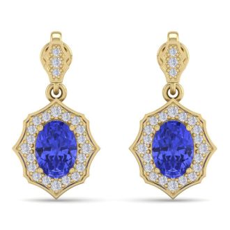 2 1/5 Carat Oval Shape Tanzanite and Diamond Dangle Earrings In 14 Karat Yellow Gold