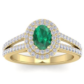 1 3/4 Carat Oval Shape Emerald and Halo Diamond Ring In 14 Karat Yellow Gold