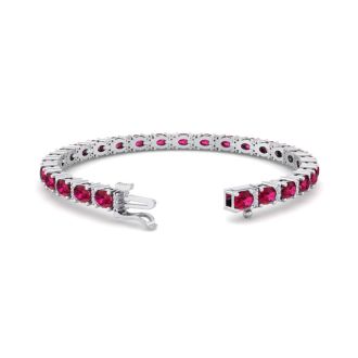 Ruby Bracelet; Ruby Tennis Bracelet; 7 Carat Oval Shape Ruby and Diamond Bracelet In 14 Karat White Gold