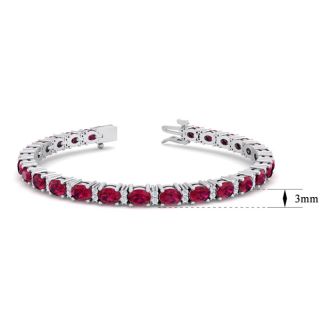 Ruby Bracelet; Ruby Tennis Bracelet; 7 Carat Oval Shape Ruby and Diamond Bracelet In 14 Karat White Gold