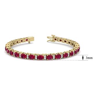Ruby Bracelet; Ruby Tennis Bracelet; 7 Carat Oval Shape Ruby and Diamond Bracelet In 14 Karat Yellow Gold