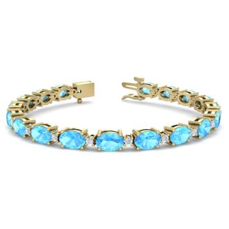 11 Carat Oval Shape Blue Topaz and Diamond Bracelet In 14 Karat Yellow Gold, 7 Inches