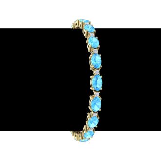 11 Carat Oval Shape Blue Topaz and Diamond Bracelet In 14 Karat Yellow Gold, 7 Inches