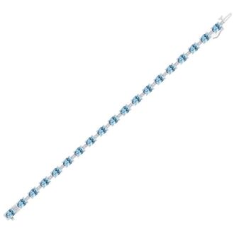 Aquamarine Bracelet: Aquamarine Jewelry: 9 Carat Oval Shape Aquamarine and Diamond Bracelet In 14 Karat White Gold, 7 Inches