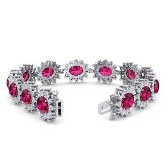 Ruby Bracelet; Ruby Tennis Bracelet; 25 Carat Oval Shape Ruby and Halo Diamond Bracelet In 14 Karat White Gold