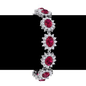 Ruby Bracelet; Ruby Tennis Bracelet; 25 Carat Oval Shape Ruby and Halo Diamond Bracelet In 14 Karat White Gold