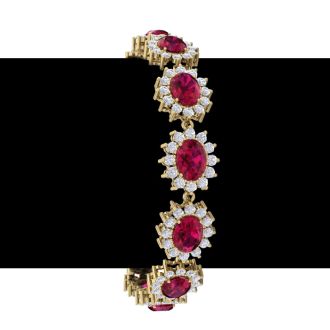 Ruby Bracelet; Ruby Tennis Bracelet; 25 Carat Oval Shape Ruby and Halo Diamond Bracelet In 14 Karat Yellow Gold