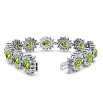 22 Carat Oval Shape Peridot and Halo Diamond Bracelet In 14 Karat White Gold, 7 Inches
