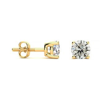 Nearly 3/4 Carat Colorless Diamond Stud Earrings In 14 Karat Yellow Gold
