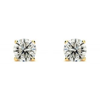 Nearly 3/4 Carat Colorless Diamond Stud Earrings In 14 Karat Yellow Gold
