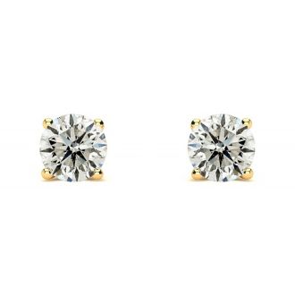 Nearly 3/4 Carat Colorless Diamond Stud Earrings In 14 Karat Yellow Gold