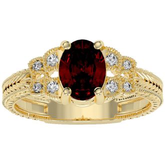 Garnet Ring: Garnet Jewelry: 1 1/2 Carat Oval Shape Garnet and Diamond Ring In 10 Karat Yellow Gold