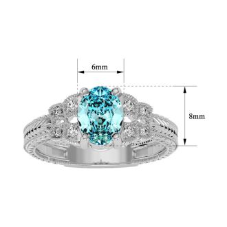 Aquamarine Ring: Aquamarine Jewelry: 1 1/4 Carat Oval Shape Aquamarine and Diamond Ring In 10 Karat White Gold