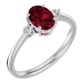 Garnet Ring: Garnet Jewelry: 1 1/2 Carat Oval Shape Garnet and Two Diamond Ring In 14 Karat White Gold