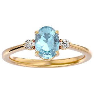 Aquamarine Ring: Aquamarine Jewelry: 1 1/4 Carat Oval Shape Aquamarine and Two Diamond Ring In 14 Karat Yellow Gold