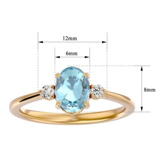 Aquamarine Ring: Aquamarine Jewelry: 1 1/4 Carat Oval Shape Aquamarine and Two Diamond Ring In 14 Karat Yellow Gold