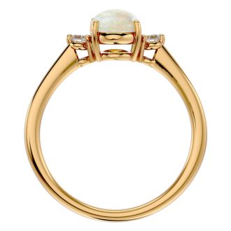 1 Carat Oval Shape Opal Ring with Two Diamonds In 14 Karat Yellow Gold