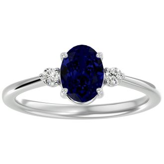 1 3/4 Carat Oval Shape Sapphire and Two Diamond Ring In 14 Karat White Gold