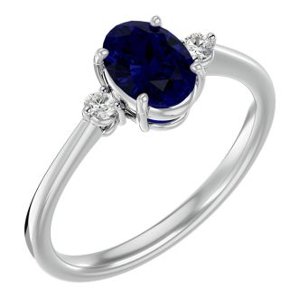 1 3/4 Carat Oval Shape Sapphire and Two Diamond Ring In 14 Karat White Gold
