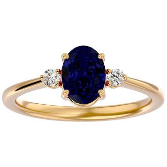 1 3/4 Carat Oval Shape Sapphire and Two Diamond Ring In 14 Karat Yellow Gold