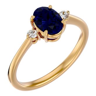 1 3/4 Carat Oval Shape Sapphire and Two Diamond Ring In 14 Karat Yellow Gold