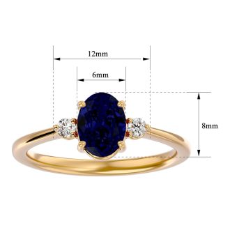 1 3/4 Carat Oval Shape Sapphire and Two Diamond Ring In 14 Karat Yellow Gold