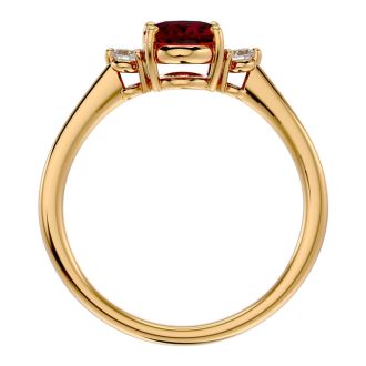 1.65 Carat Oval Shape Ruby and Two Diamond Ring In 14 Karat Yellow Gold