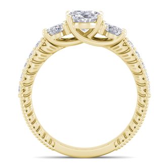 Moissanite Engagement Ring; 2 1/2 Carat Moissanite Oval Shape Three Stone Ring In 14 Karat Yellow Gold