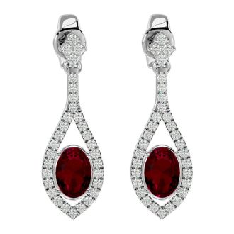 2 1/2 Carat Oval Shape Ruby and Diamond Dangle Earrings In 14 Karat White Gold