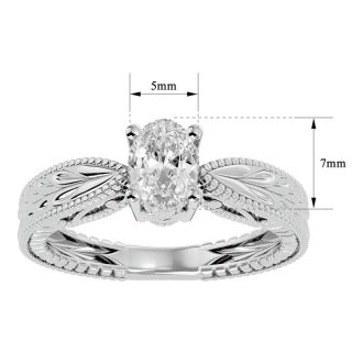 3/4 Carat Oval Shape Diamond Solitaire Engagement Ring with Tapered Etched Band In 14 Karat White Gold