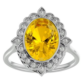 1 1/4 Carat Oval Shape Citrine and Halo Diamond Ring In 14 Karat White Gold
