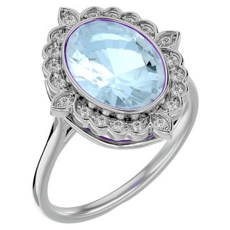 Aquamarine Ring: Aquamarine Jewelry: 1 1/3 Carat Oval Shape Aquamarine and Halo Diamond Ring In 14 Karat White Gold