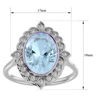 Aquamarine Ring: Aquamarine Jewelry: 1 1/3 Carat Oval Shape Aquamarine and Halo Diamond Ring In 14 Karat White Gold