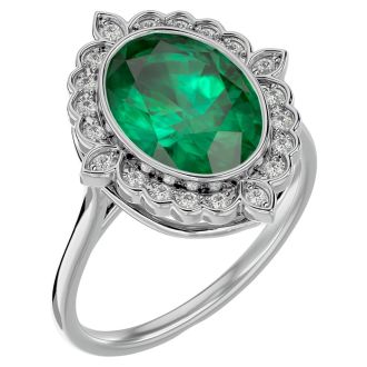 1 1/3 Carat Oval Shape Emerald and Halo Diamond Ring In 14 Karat White Gold
