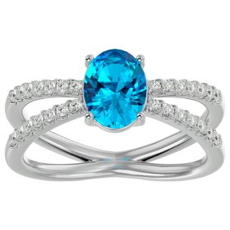 1 3/4 Carat Oval Shape Blue Topaz and Diamond Ring In 14 Karat White Gold