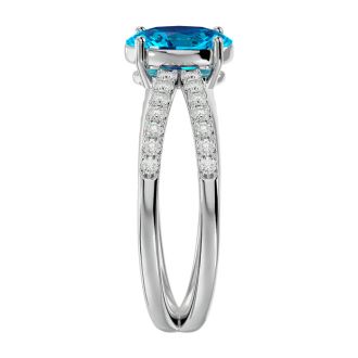 1 3/4 Carat Oval Shape Blue Topaz and Diamond Ring In 14 Karat White Gold