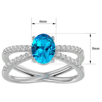 1 3/4 Carat Oval Shape Blue Topaz and Diamond Ring In 14 Karat White Gold