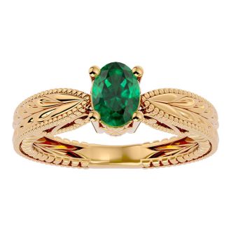 3/4 Carat Oval Shape Emerald Ring With Tapered Etched Band In 14 Karat Yellow Gold