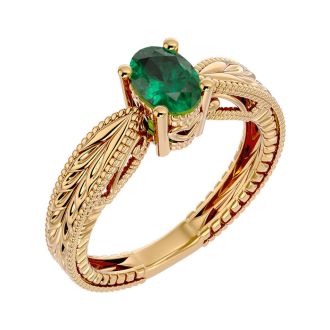 3/4 Carat Oval Shape Emerald Ring With Tapered Etched Band In 14 Karat Yellow Gold